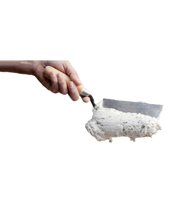 Paleta de obra con el pegamento de piedra para ver su textura y manejabilidad